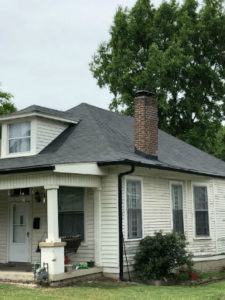 home with a masonry chimney