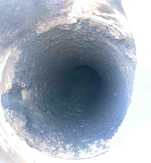 Furnace Flue Sweep Interior Pipe Before